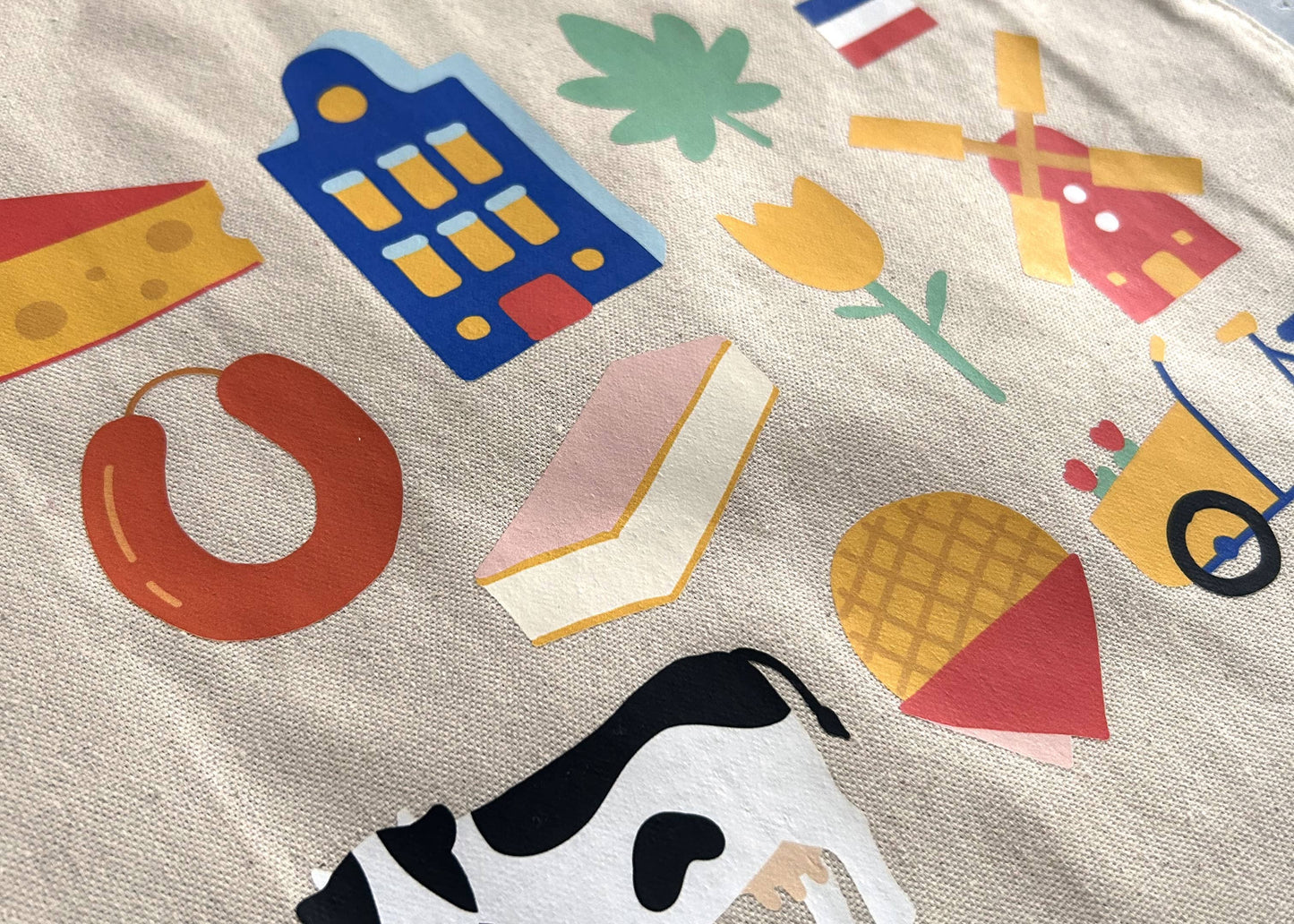 Close up of the Dutch tote bag with hand drawn icons from the Netherlands