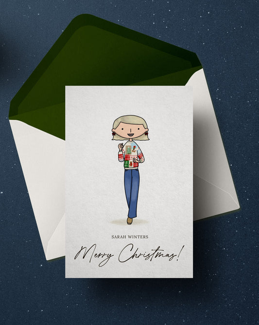 personalised Christmas card with a custom portrait illustration wearing a colorful sweater, envelope on a dark blue background