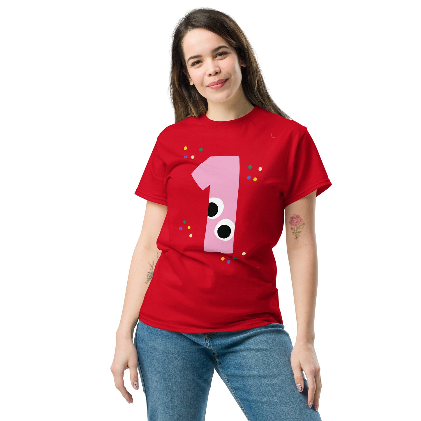 Person wearing a red t-shirt with a pink number one design on a white background