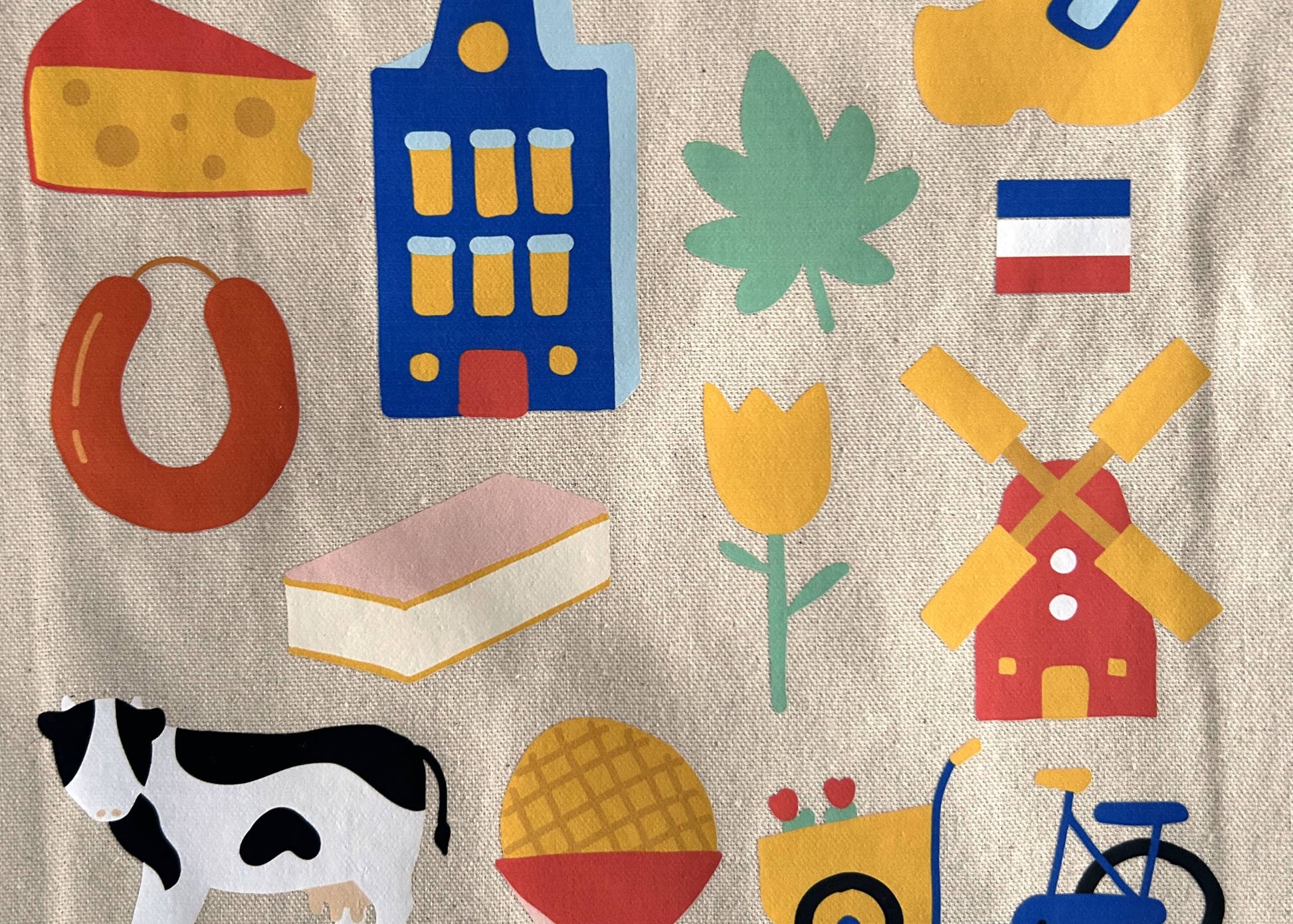 Close up of the Dutch tote bag with hand drawn icons from the Netherlands