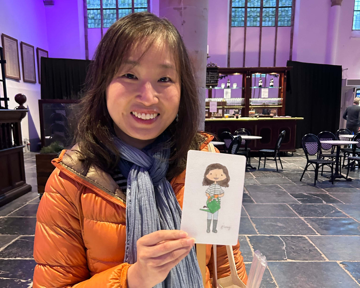 Live painting customer at a plant market, with the Garden Lover themed portrait