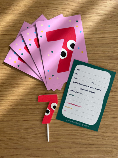 Red number 7 cake topper with googly eyes on a pink card, accompanied by a set of invitation cards
