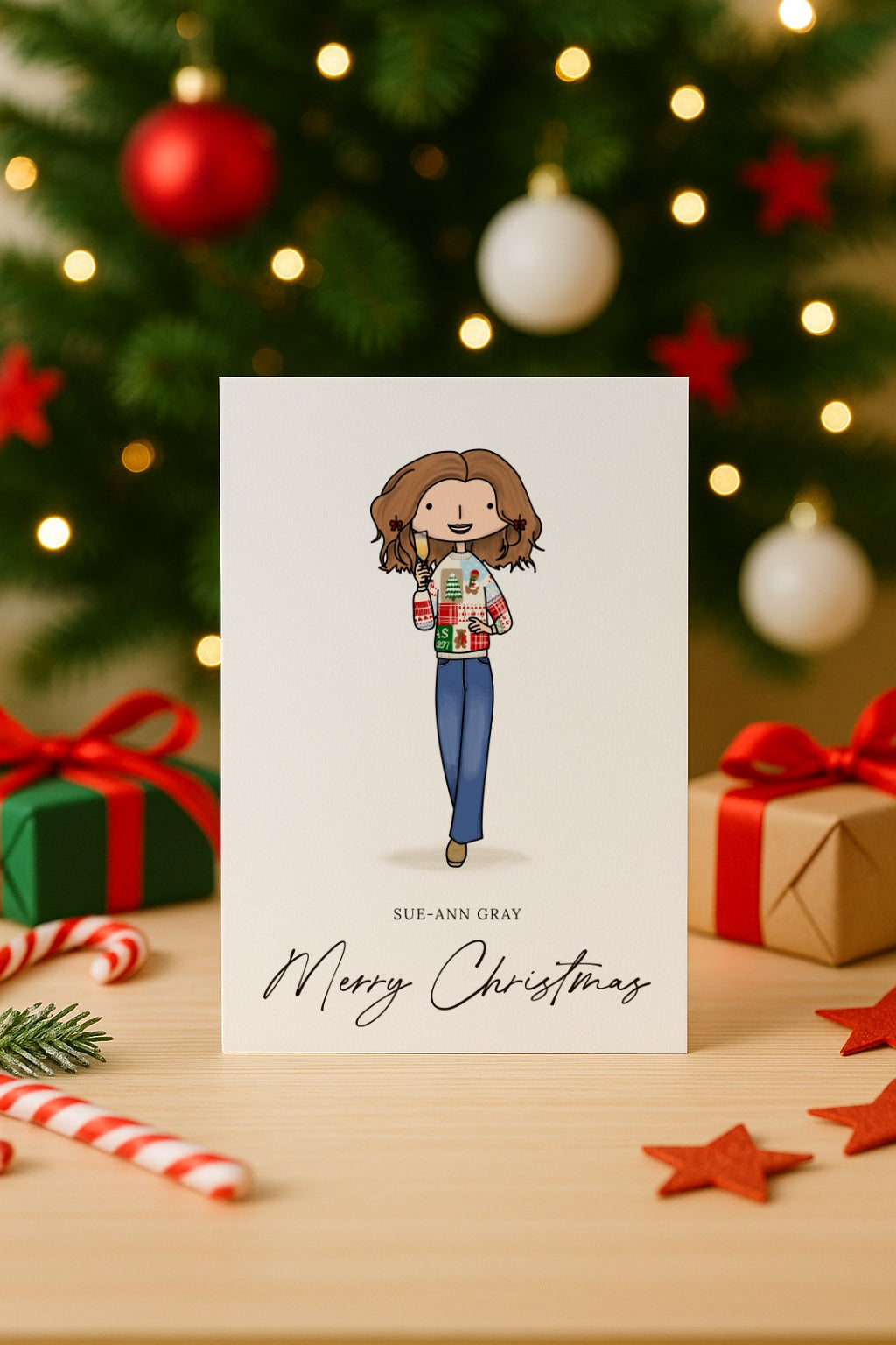 Christmas card with a portrait illustration of a person wearing a Christmas sweater in front of a decorated Christmas tree.