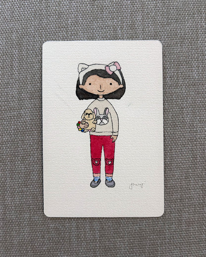 A custom watercolour portrait in postcard size of a little girl with her favourite soft toy